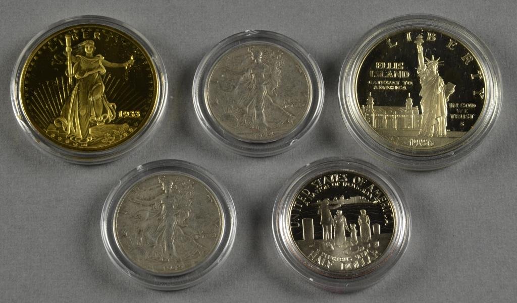 (9) U.S. Silver Coins & One Gold Clad Base: Eight U.S. silver coins to include: 2001 American Eagle uncirculated, an "America's First Silver Dollar," 1809 Spanish Dubloon, a 1944 & 1945, Standing Liberty 1/2 dollars, a 2004 Lewis & Clark, PF 69
