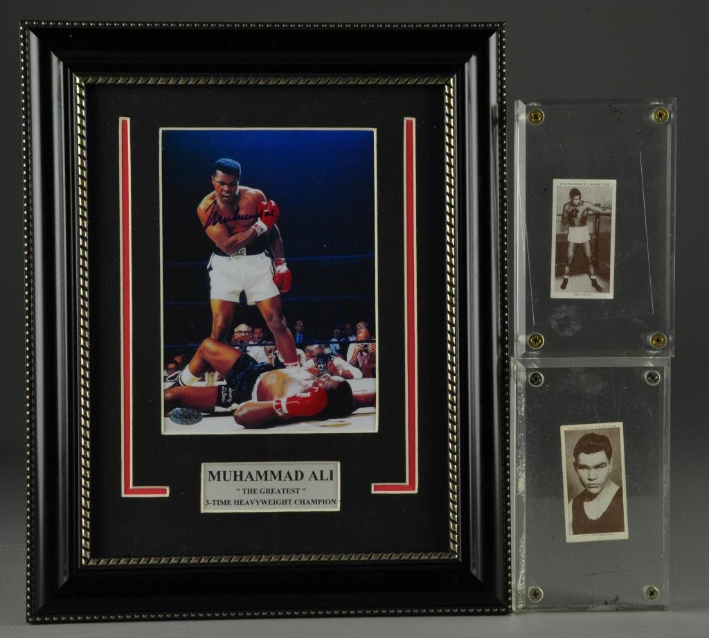 (3) Muhammad Ali Signed 1938 Joe Louis, Schmelling Card: To include a signed Muhammad Ali signed color photo of Ali knocking out Sonny Liston, 13" H x 10.5" W, sight & frame. COA by Signed Certified Memories. A 1938 Joe Lewis & Max Schmelling, Churchman's C
