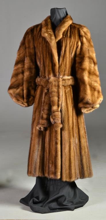 Ceresnie & Offen Full Length Mink Coat: Having a tuxedo collar and belt, stain lining with monogram, retaining label for Ceresnie & Offen, measures 49"L overall, sleeve length 26"L, shoulder width 18.5"W, circa mid 20th century. Good overal