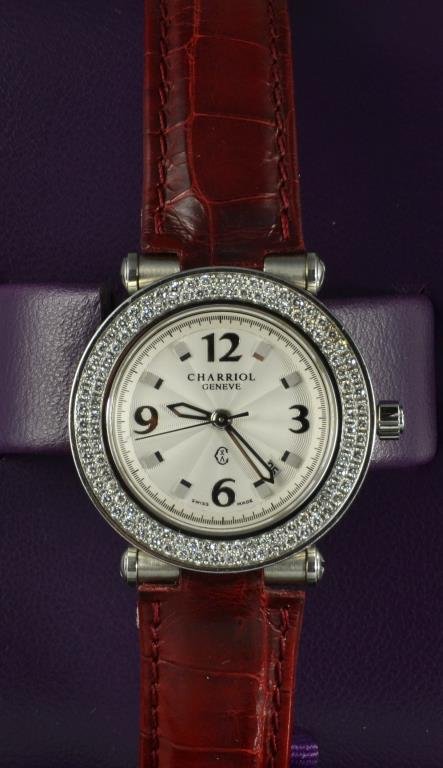 Ladies Philippe Charriol Wristwatch: Face marked Charriol Geneve, Swiss made, having a stainless case inset with diamonds, case numbered 06241, with a burgundy Louisiana alligator band, in original case, measures approximately 8"L. We do