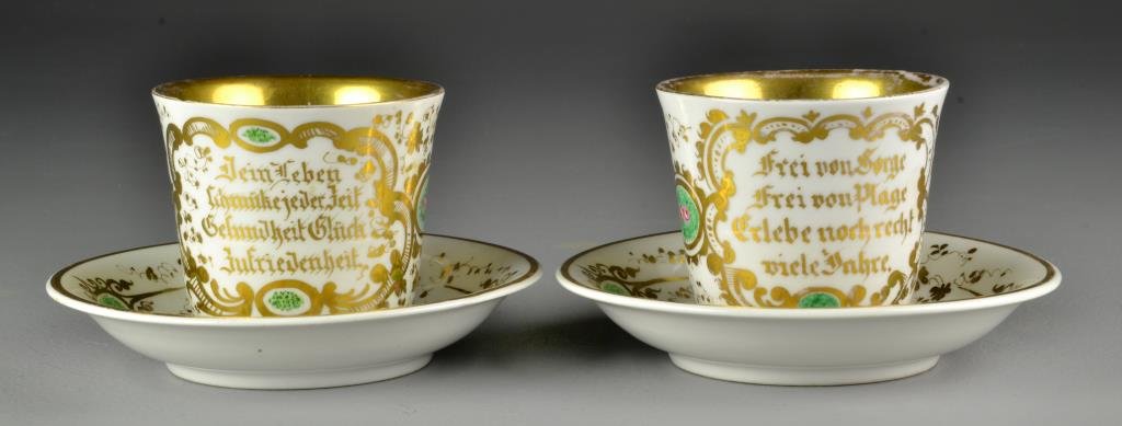 (4) Pcs. Antique KPM German Gilt Porcelain Cups &: To inlcude two large cups and two saucers, all having ornate gilt decoration and enamel roses, all having insriptions in gilt including "Berlin 1865" and marked "KPM" (Krister Porcelain Manufactory) i