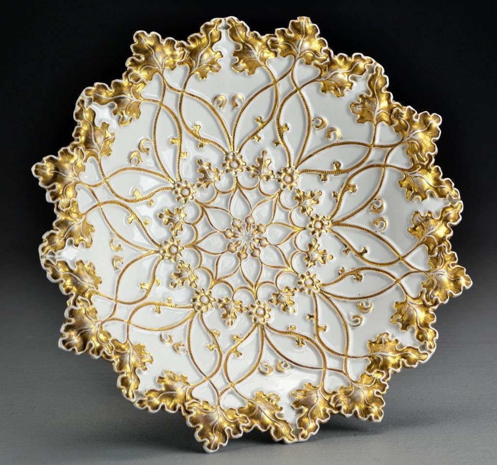 Meissen Floral & Gilt Encrusted Porcelain Bowl: Having leaf and vine border highlighted in gilt, crossed swords blue painted mark to underside, impressed 13 and numbered 16 in blue, measures 11"Dia., circa early 20th century. Property of a Washingt