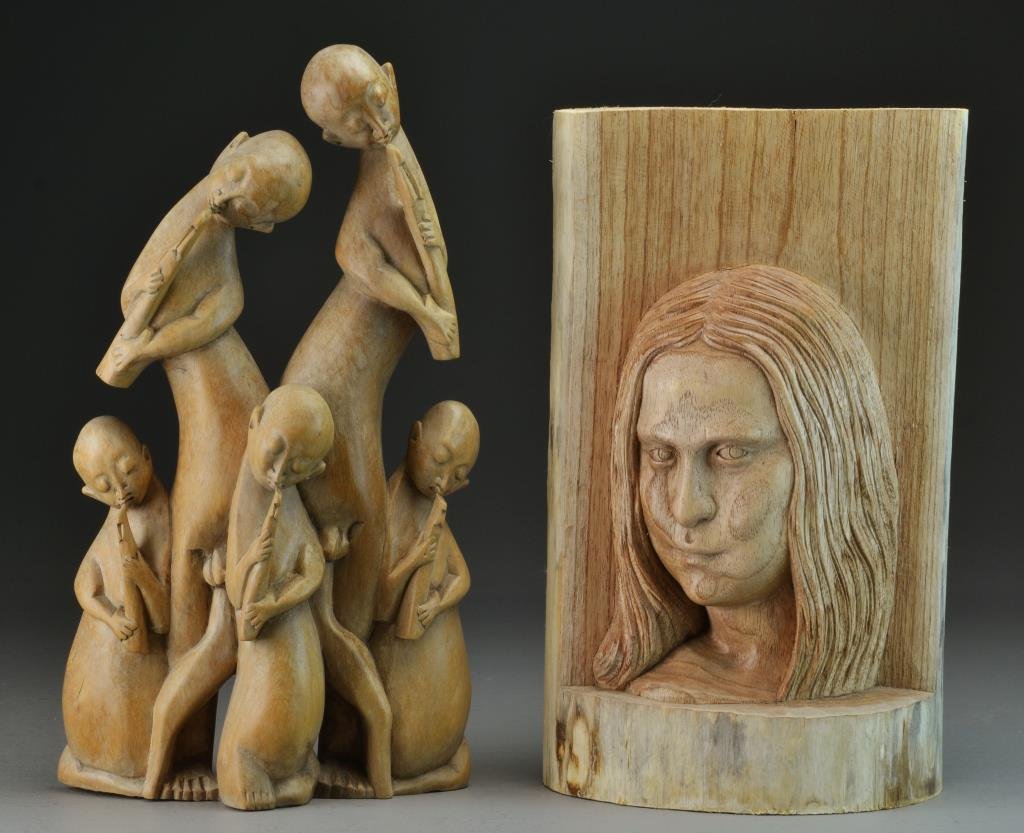 (2) Pieces Figural Carvings: To include a caving of the face of the Mona Lisa together with an Asian carving depicting figures playing flutes, tallest is 14"H. Property of a Spring Lake, MI gentleman.