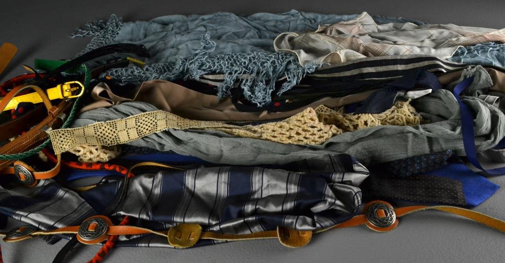 (100+) Grouping of Scarves, Belts and Ties: A large assortment of vintage scarves, ties and belts, makers include Saks Fifth Avenue, Barclay, Bergdorf Goodman and Calvin Klein among several others, circa 20th century.