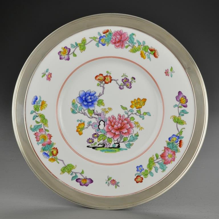 Copeland Spode Sterling Mounted Platter: Decorated with flowers, underside marked for Copeland Spode with additional painted marks, sterling frame marked Shreve & Co. San Francisco, measures 11.75"Dia., circa mid 20th century.