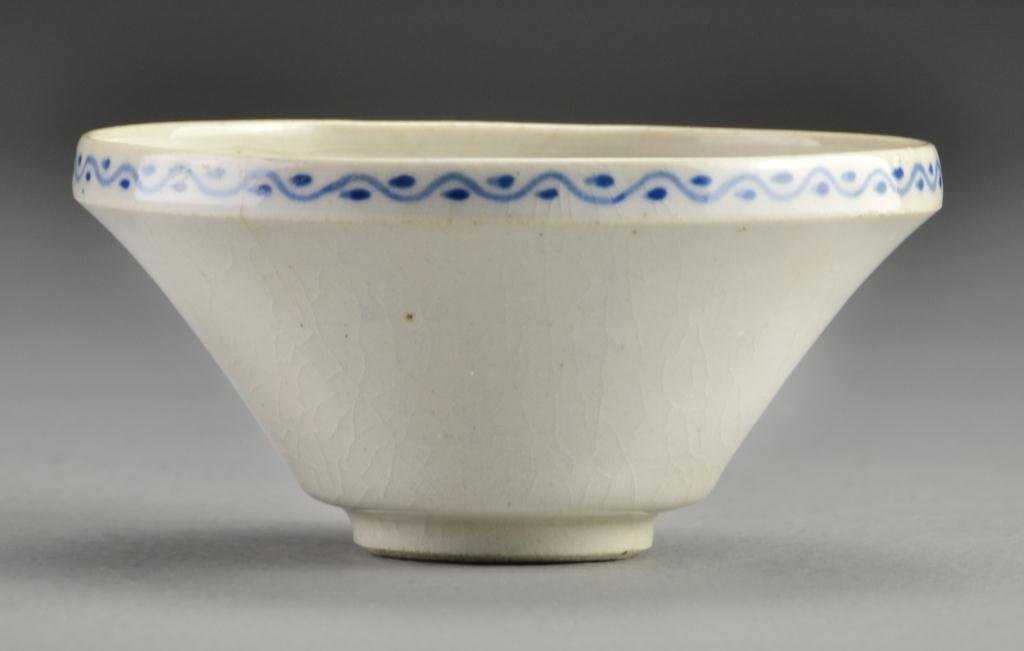 Japanese Blue and White Porcelain Bowl: Painted to depict flowers, unsigned, 4.75"D, circa early 20th century. Collection of the Late Robert Willis owner of R.F. Willis Galleries, Grand Rapids, Michigan.