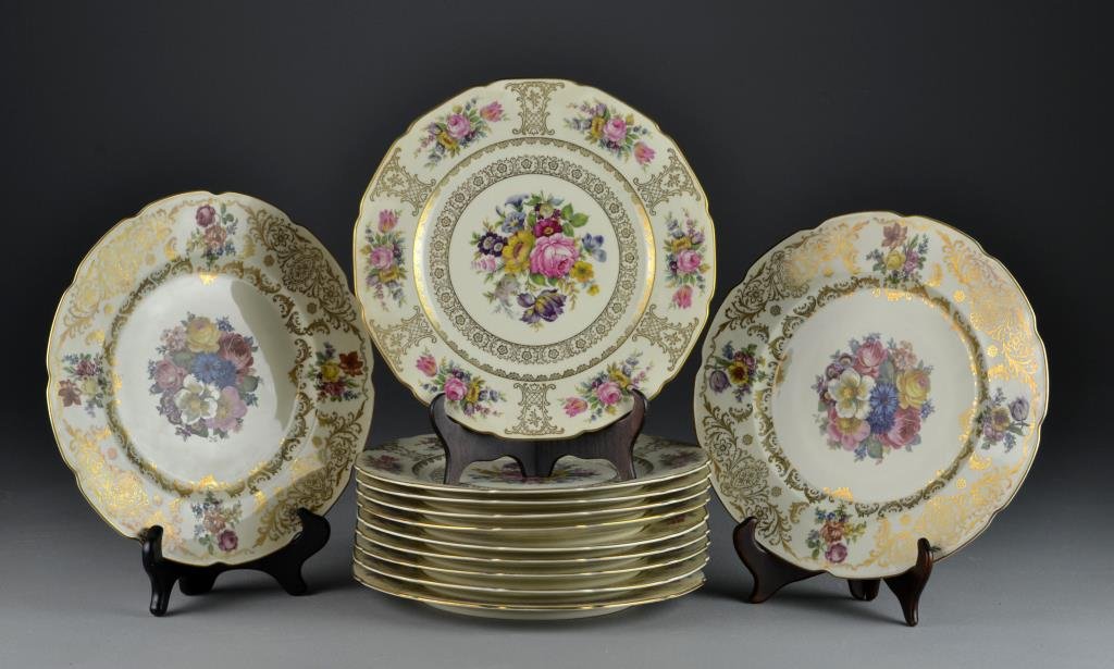 (12) Bavarian Floral & Gilt Decorated Dinner Plates: All with floral motif and heavy gilt border, ten marked "Continental Bavaria Ivory", two marked "Bavaria Schumann", largest measures 11"Dia., circa 20th century. Condition: all with light surface wear