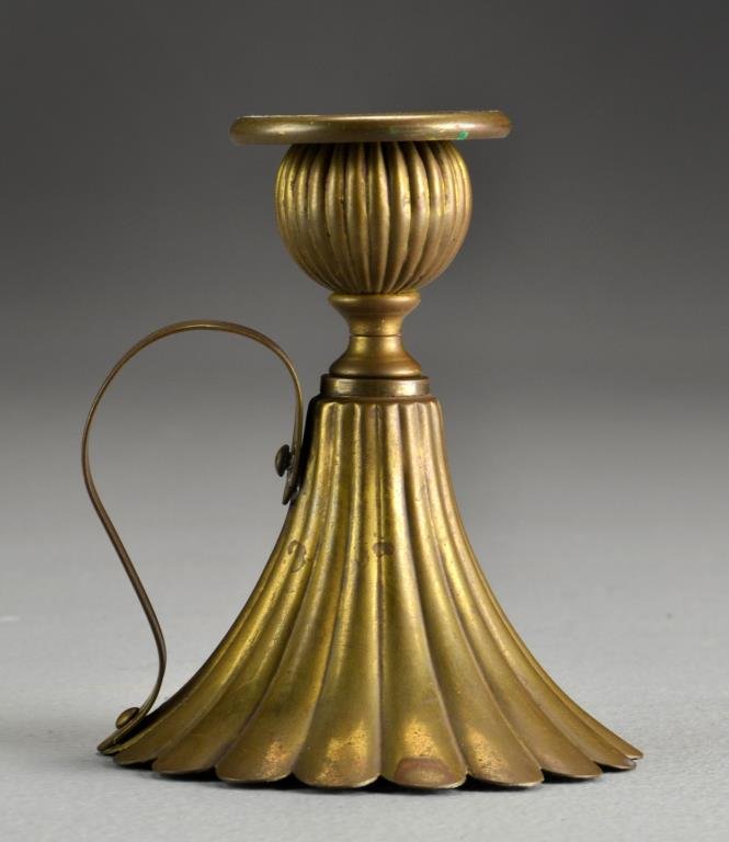 A Fine Gilt Brass Art Nouveau Chamber Stick: Of flower form, having a ribbed body and bass, 4.75"H, circa late 19th century. Condition: With wear to gilt primarily on the exterior.