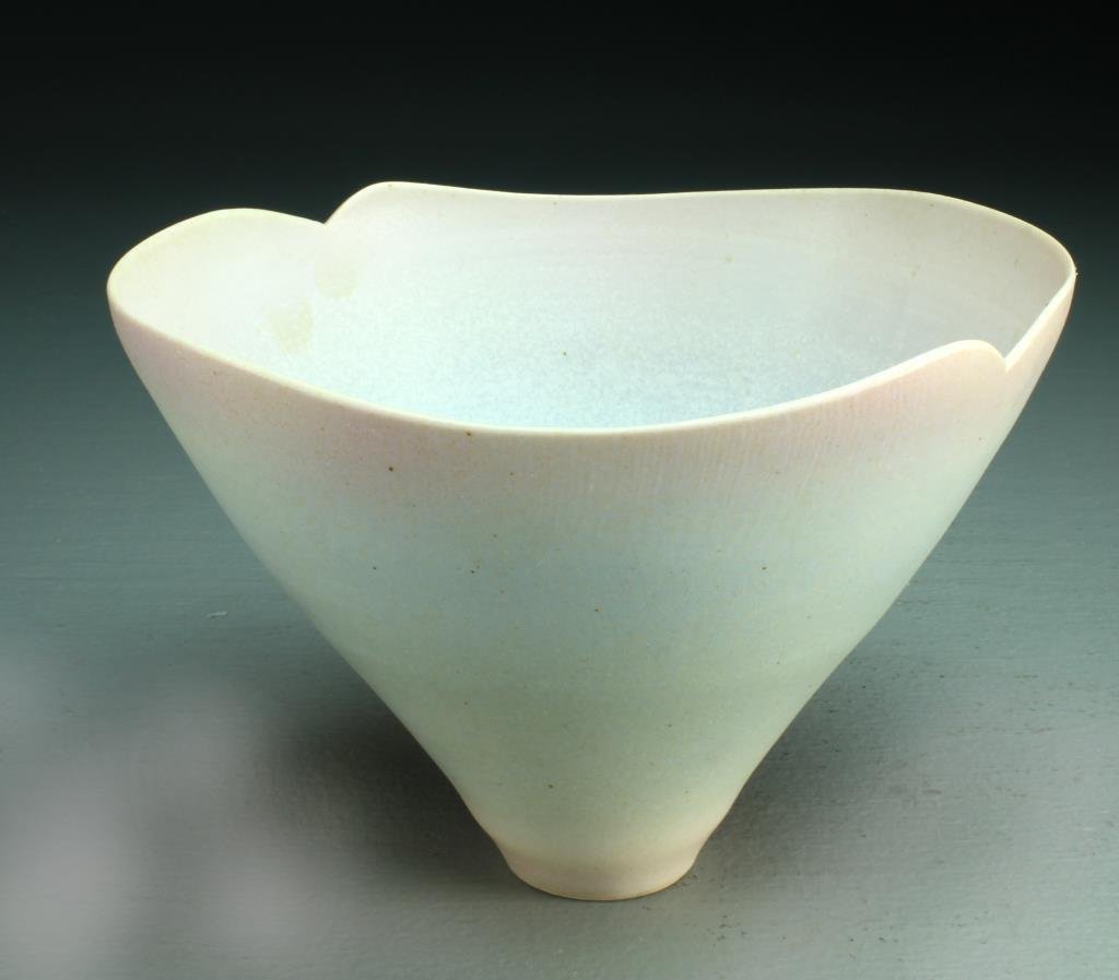 Benzle Eggshell Thin Porcelain Bowl: Of conical form having a torn rim and decorated in rainbow shaded colors, unsigned, Curtis (1949-) and Suzan (1950-) Benzle are American artists known for clay work, measures 5.5"H x 7.5"D, circa 20th