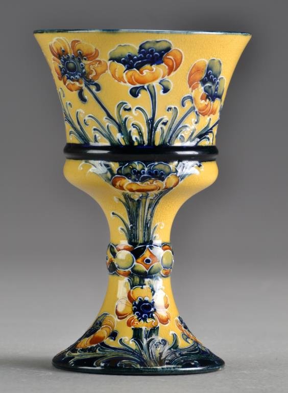 Moorcroft Macintyre Poppy Chalice: Decorated with poppies and exhibiting fine crazing throughout, underside signed W. Moorcroft for William Moorcroft, with brown stamp mark for Macintyre & Co, Burslem and registration number 401753, ci