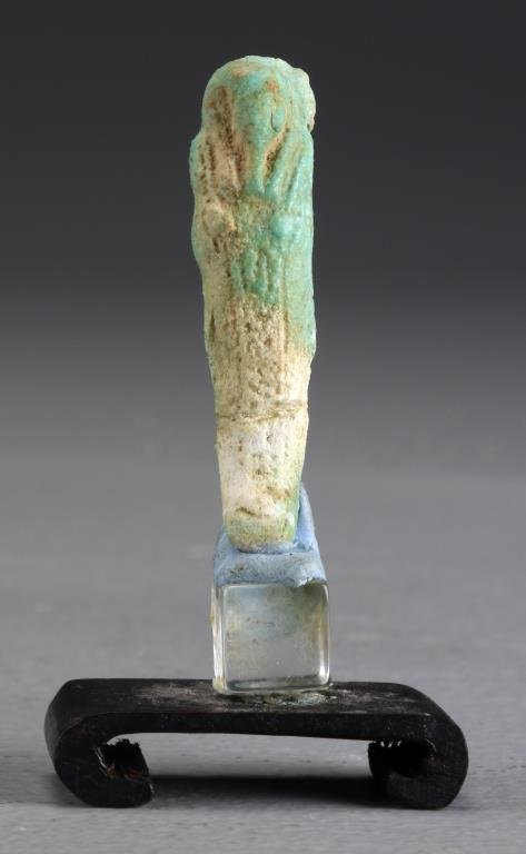 Ancient Egyptian Pottery Tomb Figure: Molded as an Egyptian sarcophagus, now affixed to a Lucite stand with museum putty, figure measures 2.25"H not including stand.