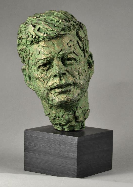 Robert Berks Bust of John F. Kennedy: A pottery bust of John F. Kennedy with applied verdigris patina, a larger scale example appeared in the dedication opening of the John F. Kennedy Center for the Performing Arts, the original was sculp