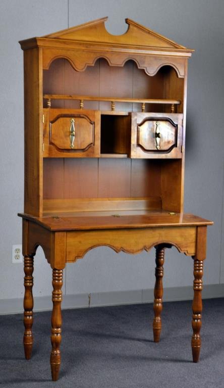 Vintage Maple Secretary: Two doors beneath a shelf above the desk top which lift up to reveal an open interior, 70"H X 36"W X 19"D.