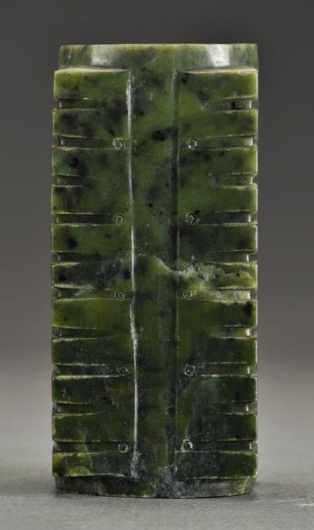 Chinese Soapstone Cong Vase: With geometric designs carved to surface, spinach green in color with black inclusions, measures 7"H, circa 19th-20th century.