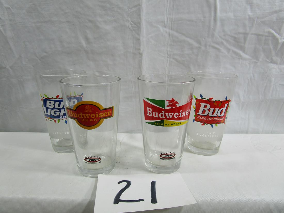 Lot Of 3 Budweiser Bud Light Glasses: These chunky glasses are in very nice condition. None of them have any damage to report. They are about 6" tall and 3 1/4" diameter.