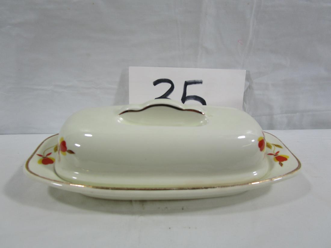 Superior Hall Autumn Leaf Butter Dish: This dish is about 3.5" tall, 8.5" long and 3" wide. It has some color loss to the gold rimming on the base piece. It also has some rubbing or discoloration in that area that is shown in the pictures.