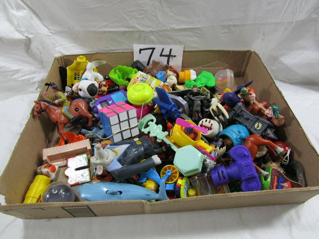 Huge Lot Mixed Toys: This lot includes McDonald's toys, a Duncan Yo Yo and a Rubix cube just to name a few pieces. This box is loaded with fun for children. Unsorted.