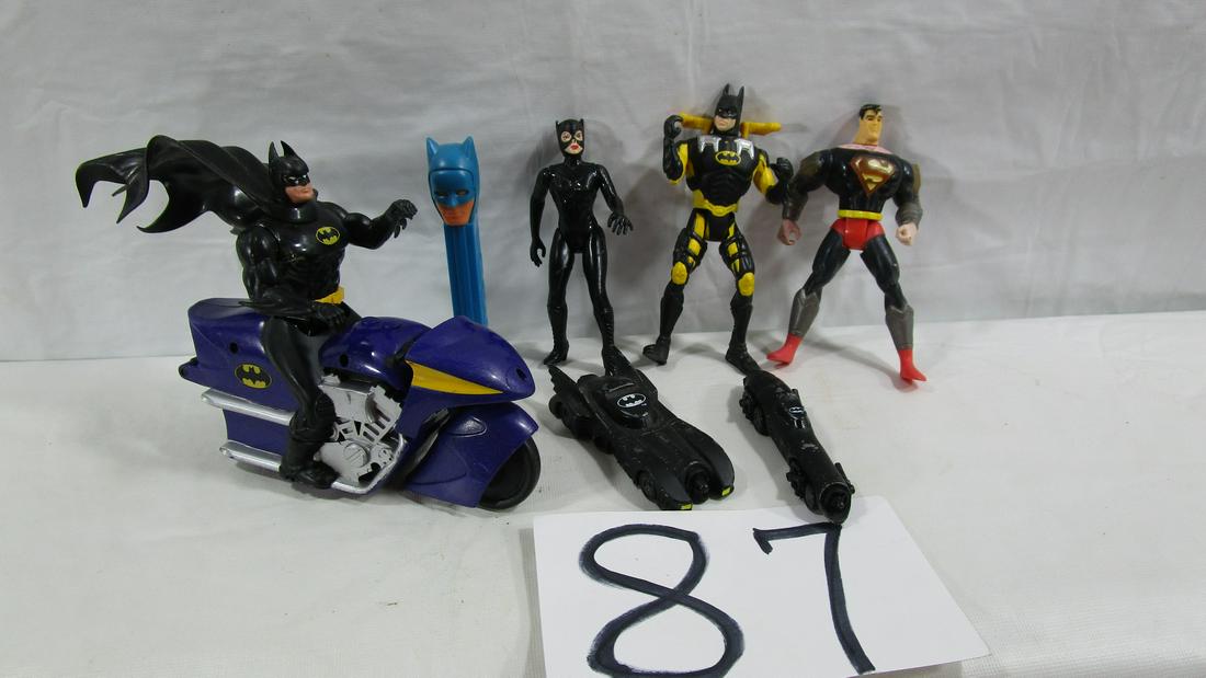 7 Piece Lot Batman Action Figures: This lot includes Batman, cat woman and Superman. They are in played with condition.