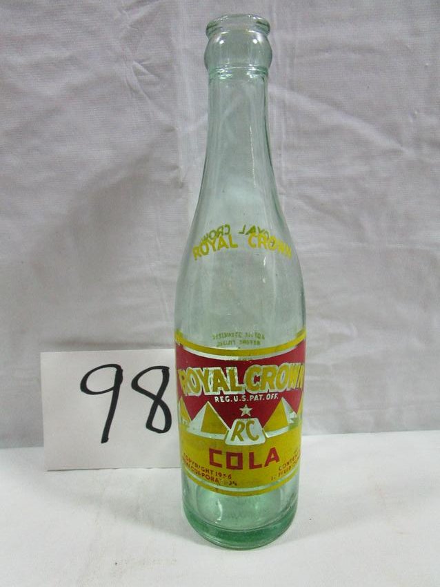 Aqua Royal Crown Cola Bottle Duraglass: This bottle is in decent condition but has a larger sized chip on the bottom. It is about 9.5" tall and 3" diameter.