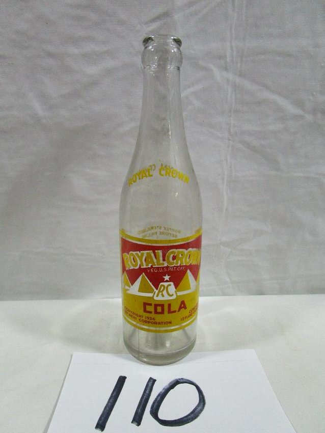 Royal Crown Cola Vintage Bottle: This bottle measures about 9.5" tall and 2.5" diameter. It is in good condition, I do not see any damage.