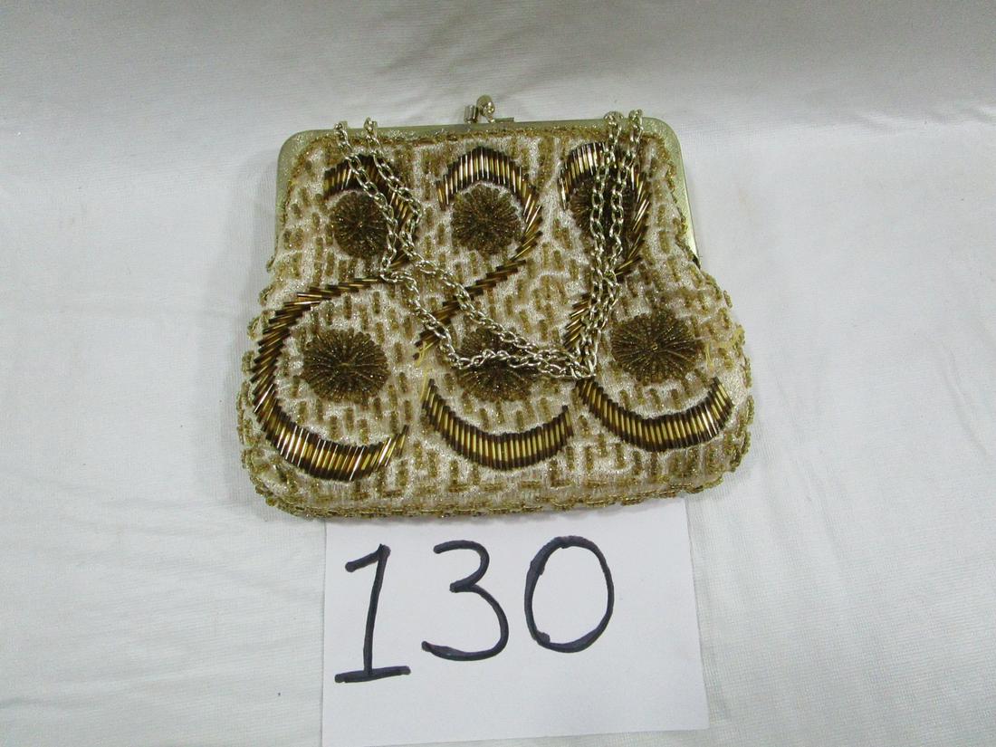Regale Seed Bead Evening Purse Bag: This bag is simply beautiful. It has gold beading on a beige background. They're some places where beads are missing with some small strings needing trimmed off. It is about 5" tall and 6" wide. It ha