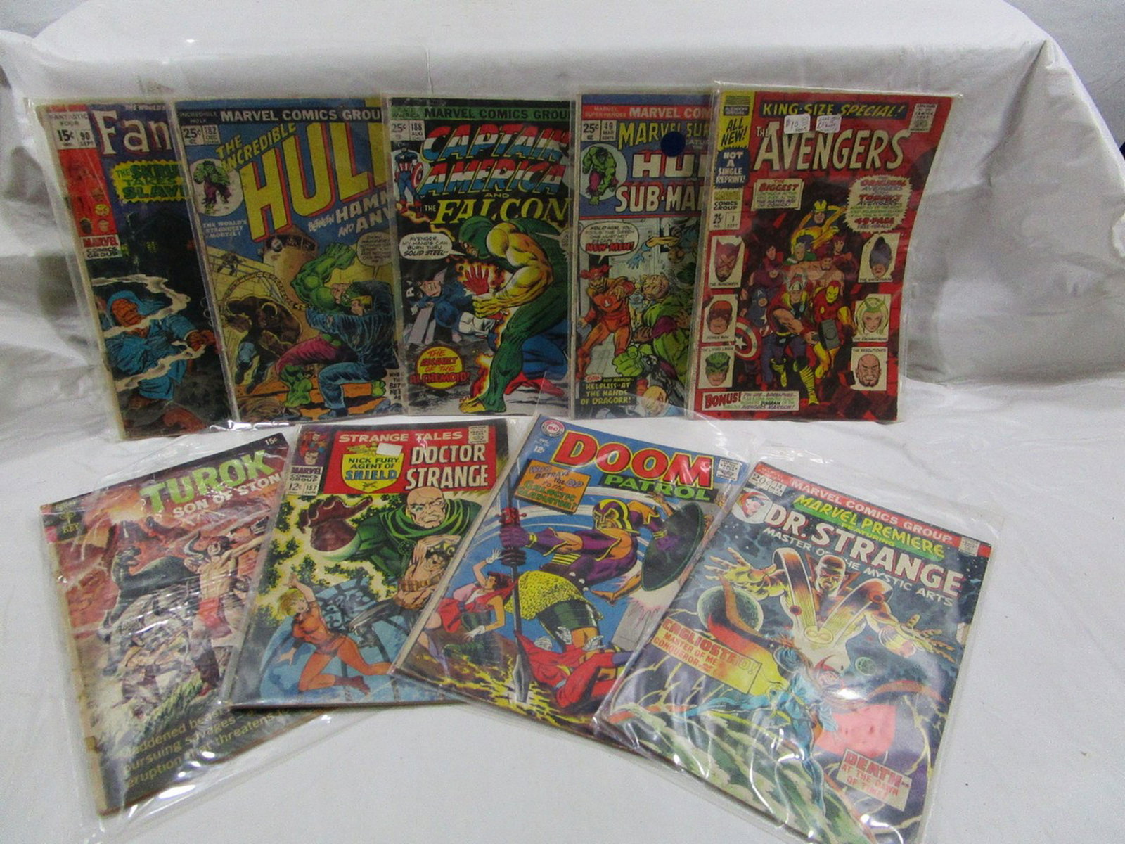Lot Of 8 Comic Books Marvel , DC , Gold Key: This is a nice mixed lot of vintage comic books. Some of the titles include Marvel Captain America, Dr. Strange, Hulk, Fantastic Four just to name a few. There is also an older Gold Key Comic titled T