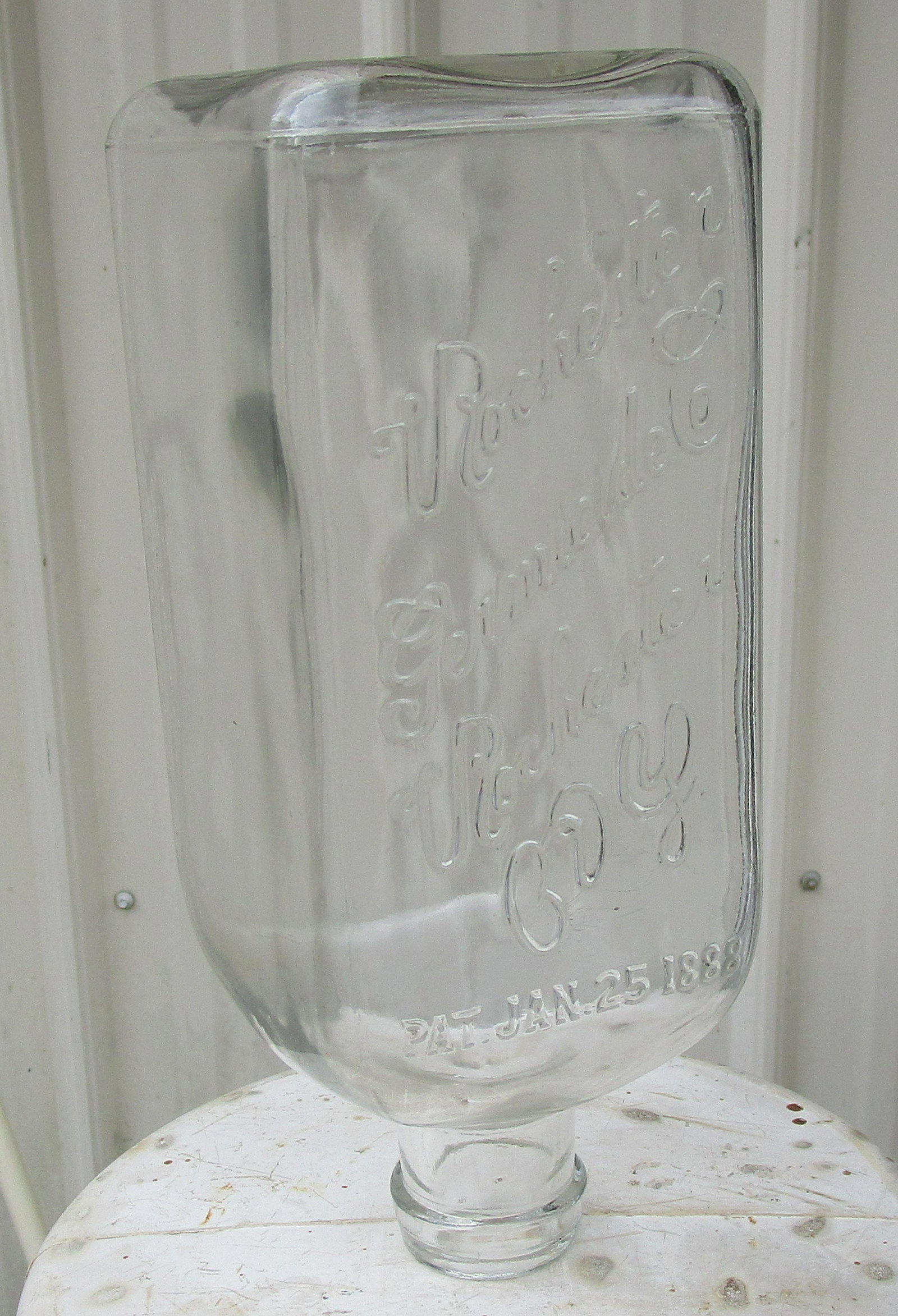 Vintage Rochester Germacide Embalming Fluid Bottle: This bottle has no flaws. It is about 8.5" tall and 3" square. The mouth of the bottle is about 1 1/4" diameter.