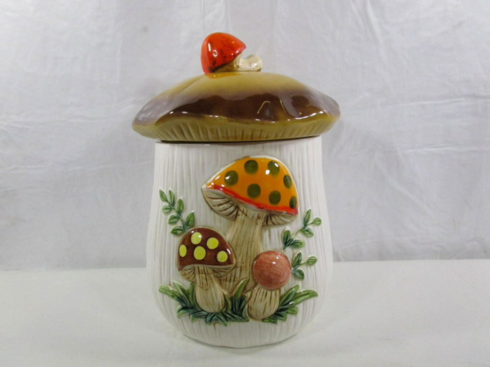 Large Merry Mushroom Canister Sears & Roebuck: This canister was produced in 1983 and is in nice condition. It is about 10.5" tall and 6" diameter at the rim. We have the small and medium one listed also.