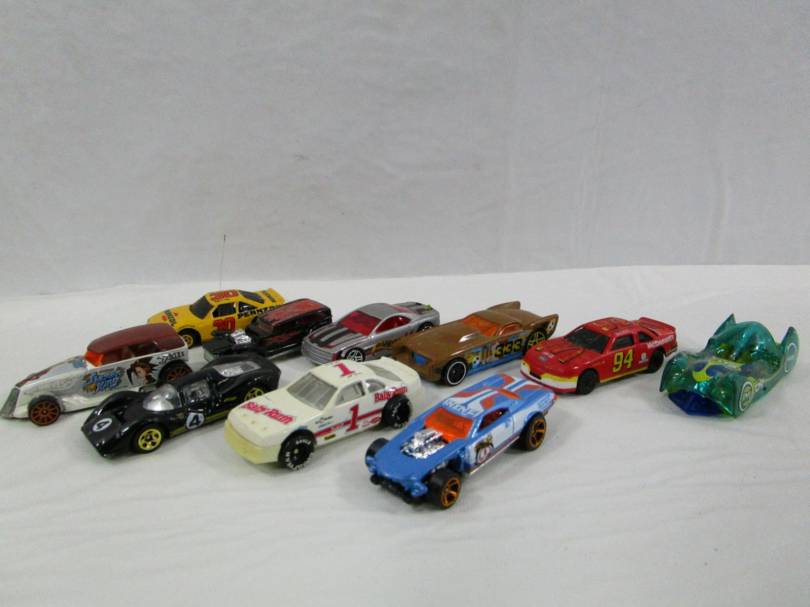 Lot Of 10 Metal Hot Wheels Mixed Lot Cars: These cars are in nice condition and have a lot of different makers. They're quite a few Hot Wheels cars.