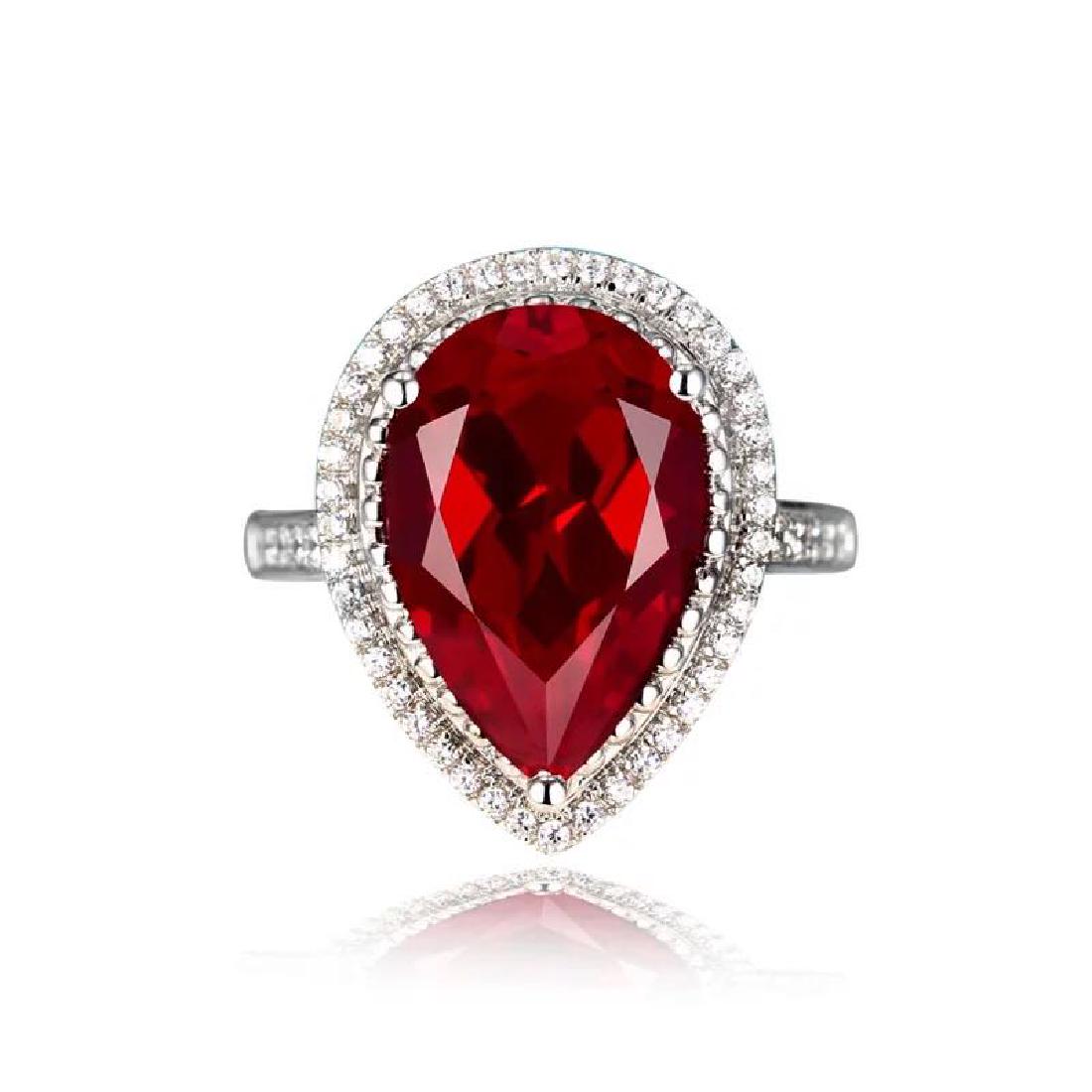925 Silver 7.51ct Ruby 0.531ct Diamond Ring: 925 Silver 7.51ct Ruby 0.531ct Diamond Ring ****** Metal: 925 Silver / Total Item Weight: 4.1 grams / Main Stone: Ruby / Color: Red / Carat Total Weight: 7.51 / Secondary Stone: Diamond / Carat Total