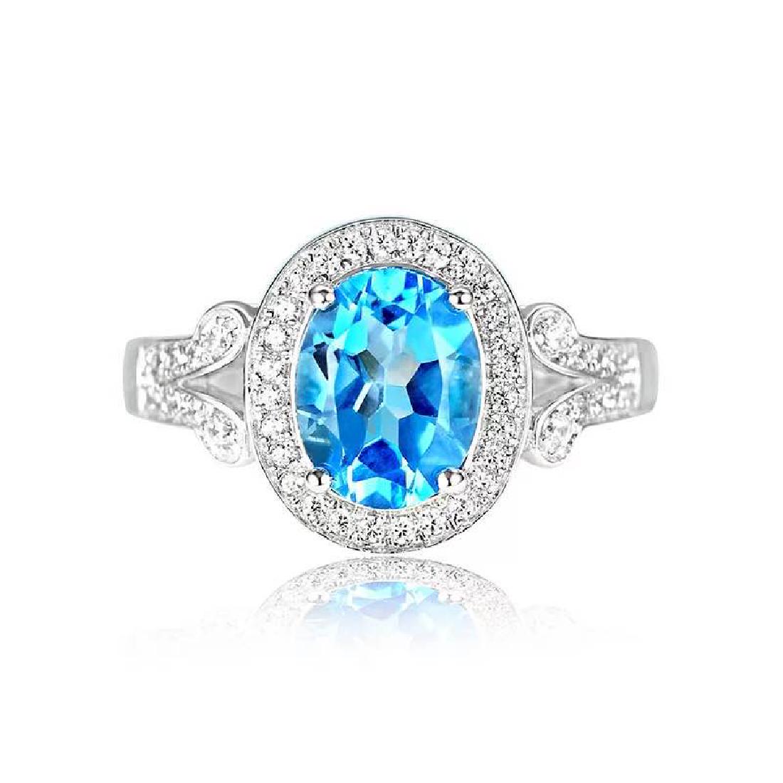 925 Silver 2.51ct Topaz 0.481ct Diamond Ring: 925 Silver 2.51ct Topaz 0.481ct Diamond Ring ****** Metal: 925 Silver / Total Item Weight: 3 grams / Main Stone: Topaz / Color: Blue / Carat Total Weight: 2.51 / Secondary Stone: Diamond / Carat Total