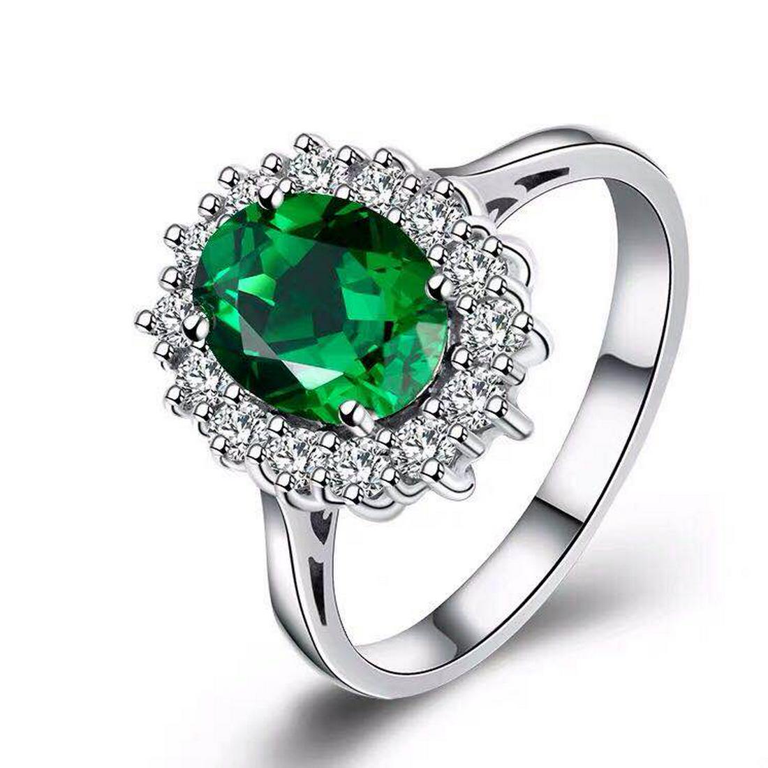 925 Silver 2.51ct Emerald 0.412ct Diamond Ring: 925 Silver 2.51ct Emerald 0.412ct Diamond Ring ****** Metal: 925 Silver / Total Item Weight: 2.5 grams / Main Stone: Emerald / Color: Green / Carat Total Weight: 2.51 / Secondary Stone: Diamond / Cara