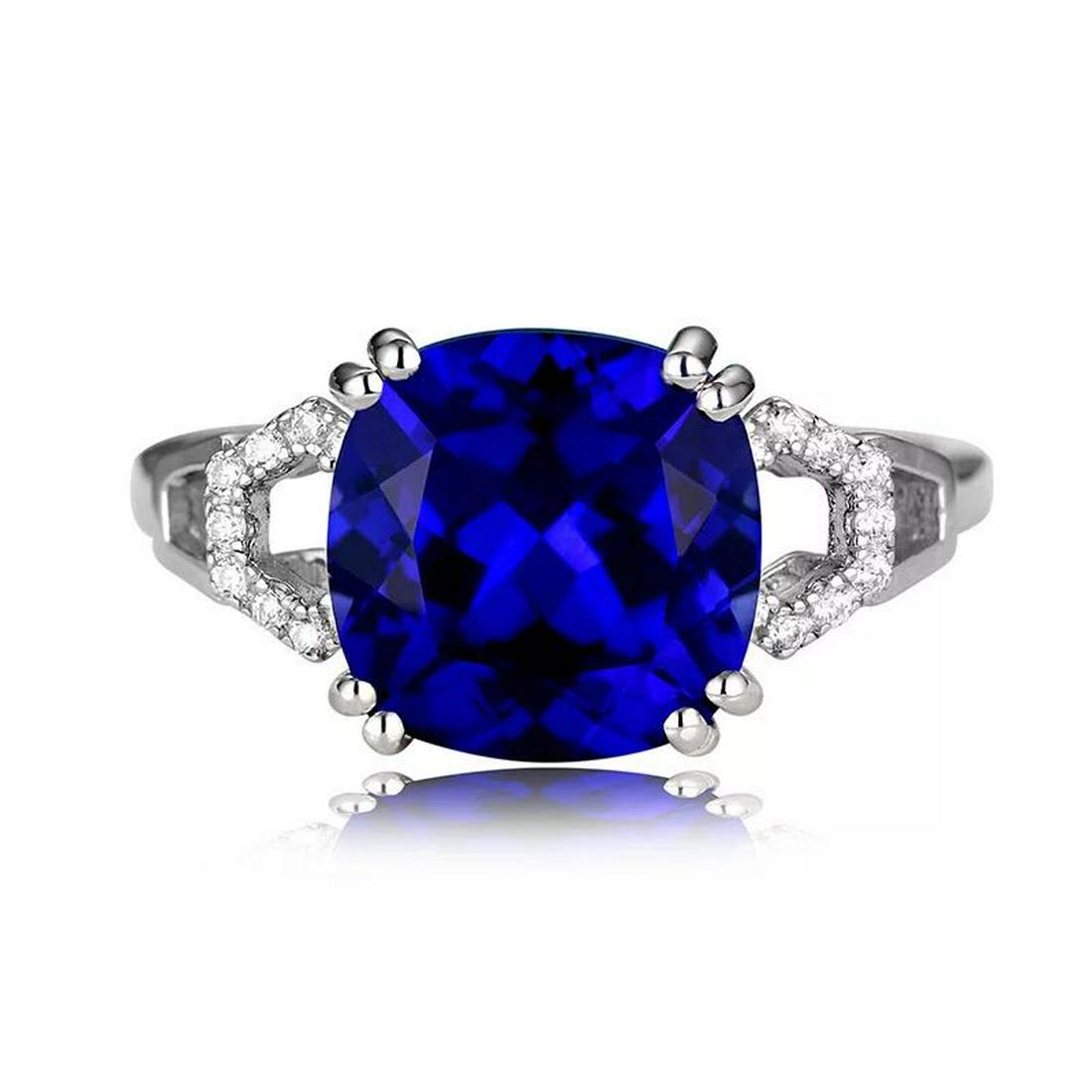 925 Silver 4.21ct Tanzanite 0.181ct Diamond Ring: 925 Silver 4.21ct Tanzanite 0.181ct Diamond Ring ****** Metal: 925 Silver / Total Item Weight: 2.5 grams / Main Stone: Tanzanite / Color: Blue / Carat Total Weight: 4.21 / Secondary Stone: Diamond / C