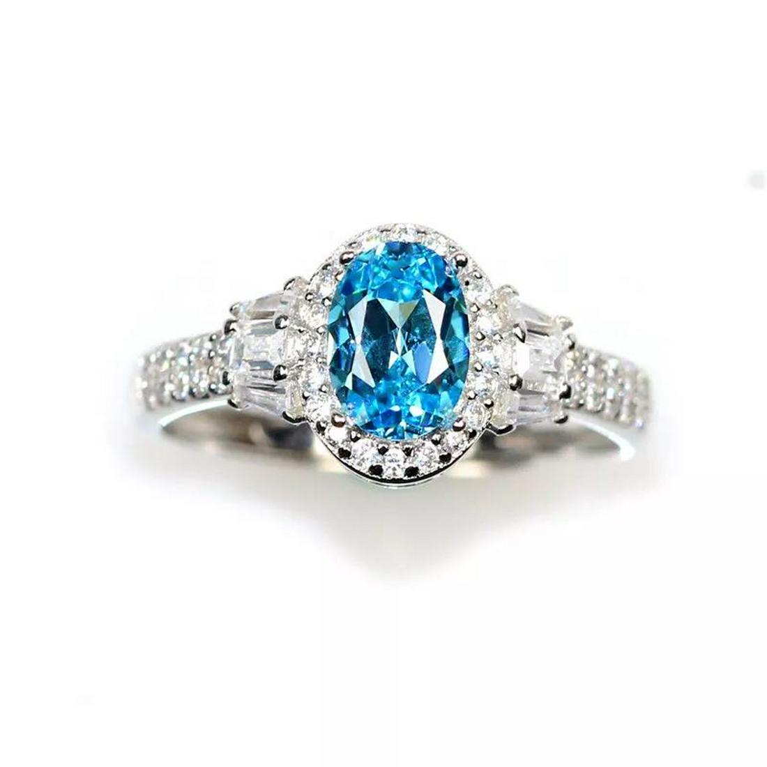 925 Silver 1.51ct Topaz 0.321ct Diamond Ring: 925 Silver 1.51ct Topaz 0.321ct Diamond Ring ****** Metal: 925 Silver / Total Item Weight: 2 grams / Main Stone: Topaz / Color: Blue / Carat Total Weight: 1.51 / Secondary Stone: Diamond / Carat Total