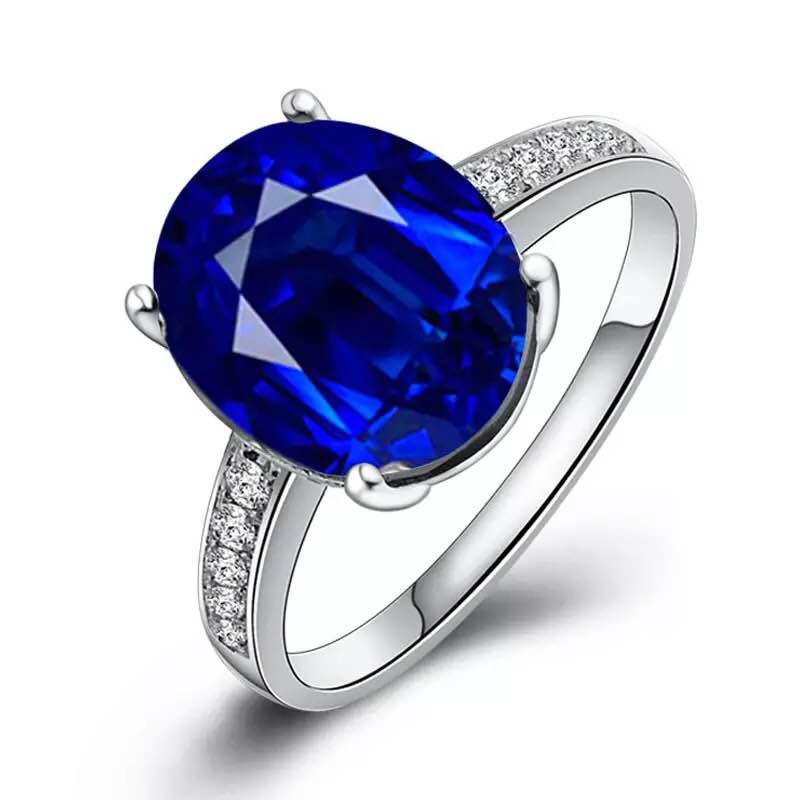 925 Silver 6.5ct Tanzanite 0.221ct Diamond Ring: 925 Silver 6.5ct Tanzanite 0.221ct Diamond Ring ****** Metal: 925 Silver / Total Item Weight: 3.6 grams / Main Stone: Tanzanite / Color: Blue / Carat Total Weight: 6.5 / Secondary Stone: Diamond / Car