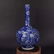 A BLUE WHITE VASE WITH DRAGON PAINTING