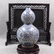 A BLUE WHITE PORCELAIN GOURD SHAPED VASE WITH PHOENIX