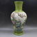 A QIANLONG MARK FAMILLE ROSE VASE WITH BIRDS AND
