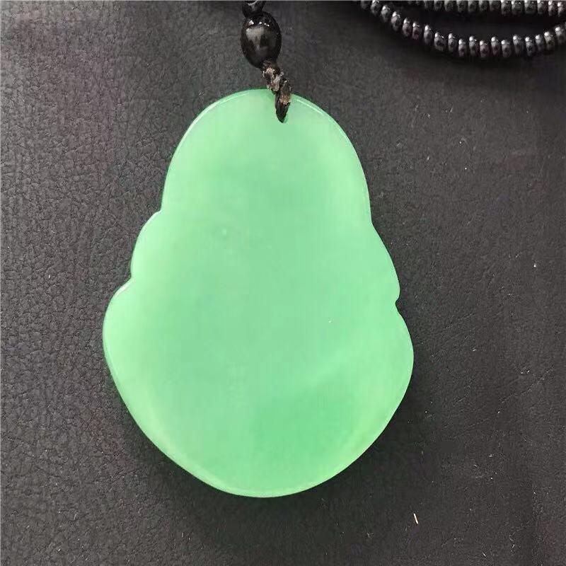 A JADE BUDDHA PENDANT - 3