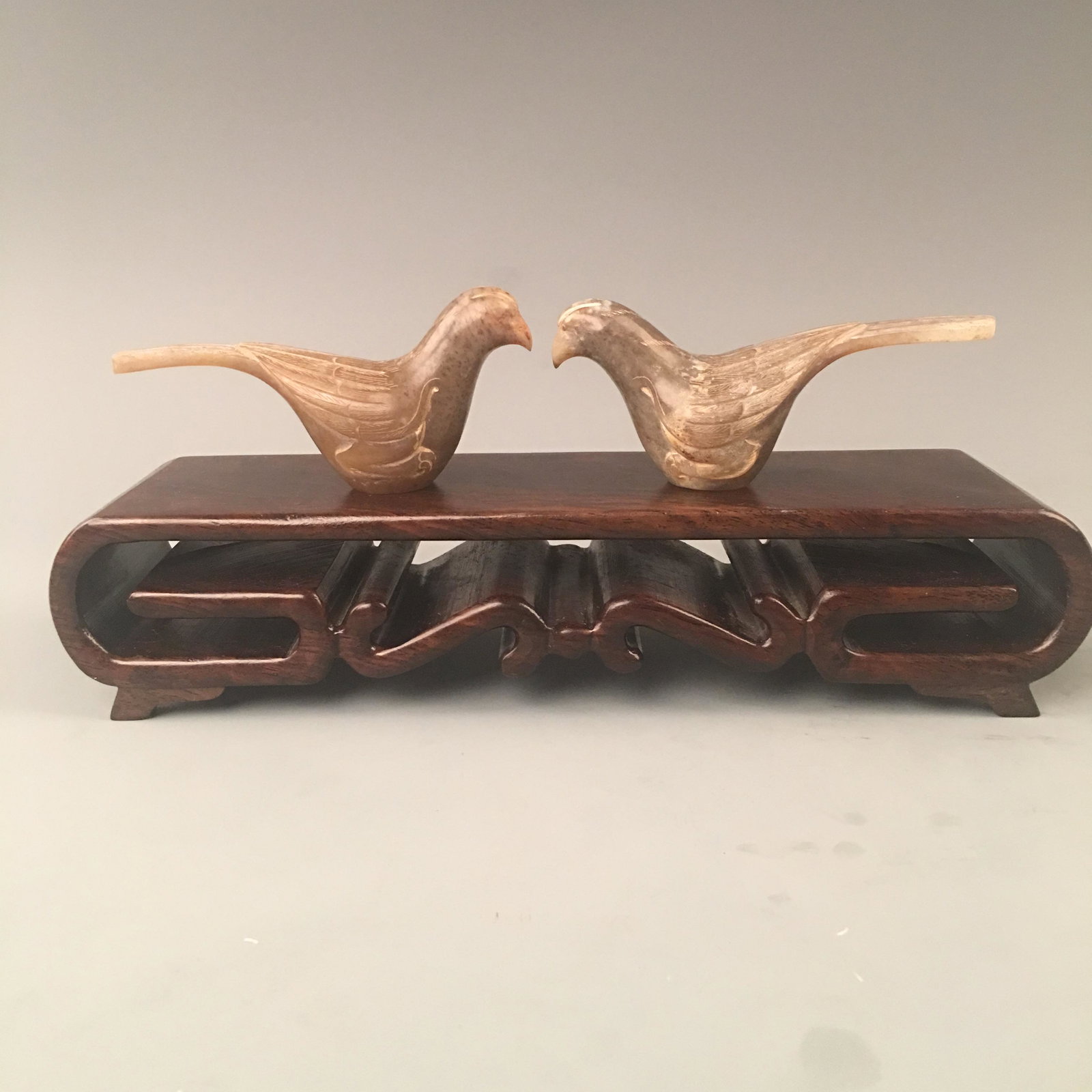 Chinese Pair of Han Dynasty Jade Birds: Chinese Pair of Han Dynasty Jade Birds 2-1/7'' W , 5'' H; 293 g Shipping: We are able to pack and ship this item to an address in the United States via UPS Ground or USPS Priority Mail for $40.00. Tra