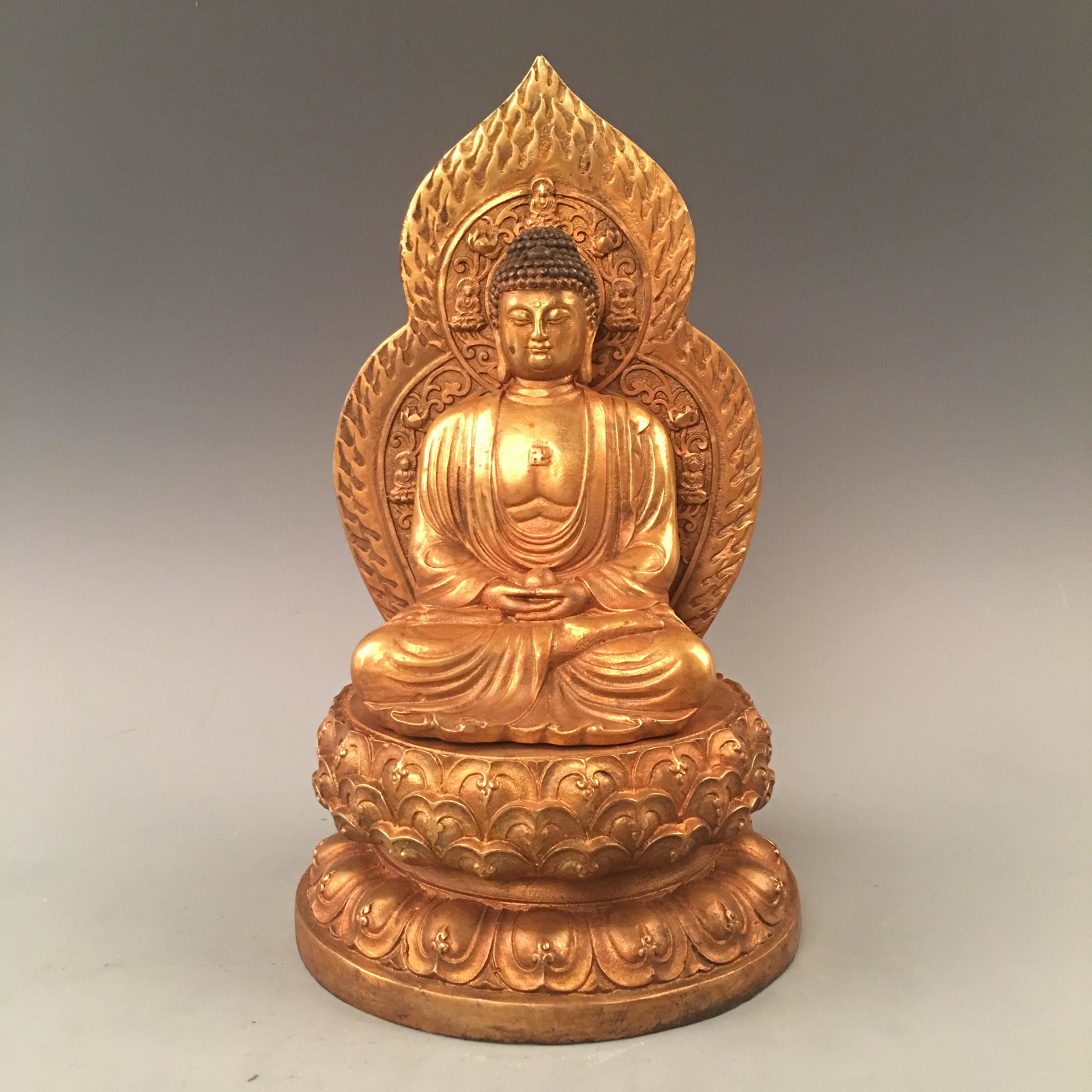 Chinese Bronze Figure of Sakyamuni: Chinese Bronze Figure of Sakyamuni 11-5/8'' H; 6-5/8'' W; 7 lb Shipping: We are able to pack and ship this item to an address in the United States via UPS Ground or USPS Priority Mail for $45.00. Trac
