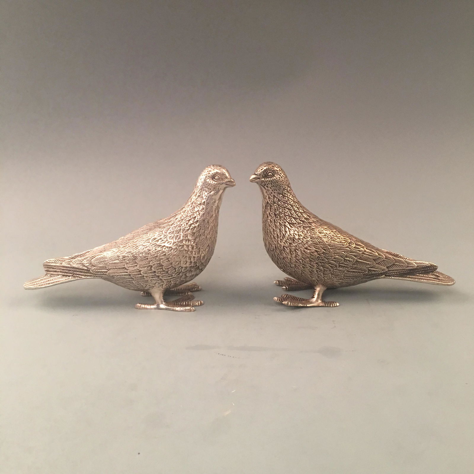 Chinese Pair of Silver Birds Decorations: Chinese Pair of Silver Birds Decorations 7-1/4'' H, 5-1/8'' W; 953 g Shipping: We are able to pack and ship this item to an address in the United States via UPS Ground or USPS Priority Mail for $45.00