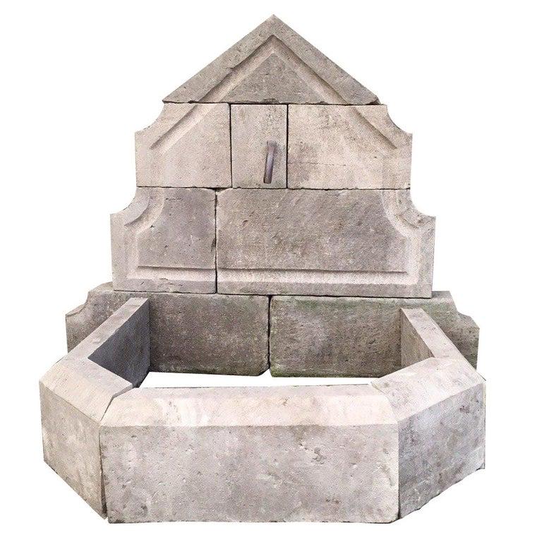 French Louis XIV Limestone Wall Fountain 21st Century: French limestone wall fountain, hand-carved in pure French antique limestone in the 21st century from France. Excellent quality of art work with French tradition, ready for installation as it is. Uniq