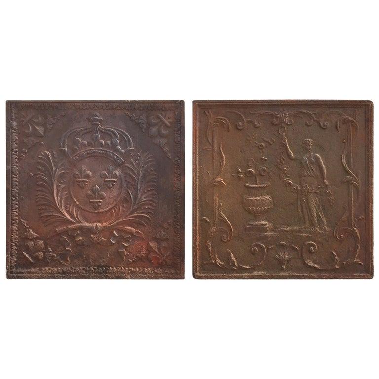 2 French antique Louis XIII & Louis XVI firebacks 19thC: A great quality of French antique Louis XIII & Louis XVI style firebacks (PAIR), hand-finished in iron, original from that period in France, 19th century. This beautiful pair comes from the same priva