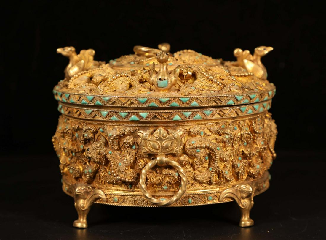 A collection of gilt silver inlaid with turquoise and (1 of 9)