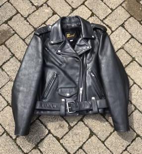 Vintage Womens Black Leather Motorcycle Jacket Small: Very cool black leather motorcycle jacket by Reed USA, womens size small, zip out lining.