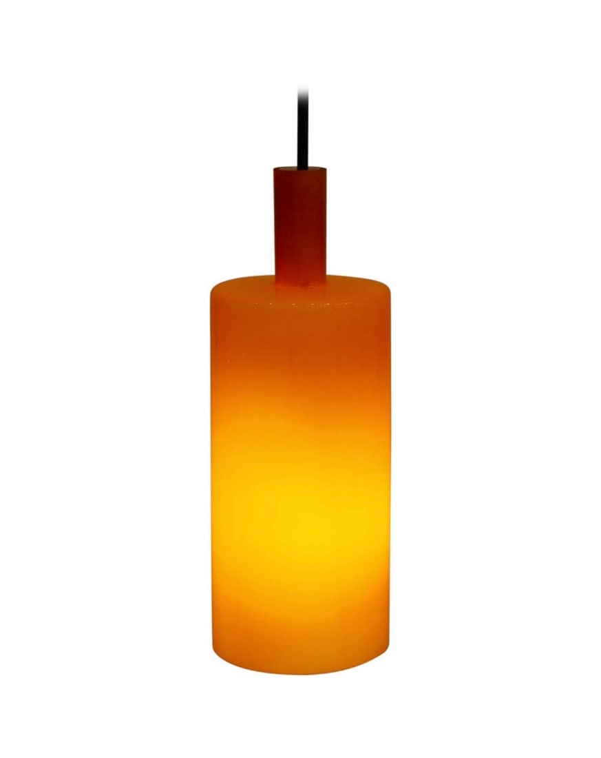 Mid Century Modern Danish Orange Pendant Light by Jo Hammerborg for Fog & Mørup: Mid Century Danish orange glass pendant light designed by Jo Hammerborg for Fog and Mørup. In 1968 this light was shown in the catalogue of F and M. The glass has an opaline inside that spreads and s