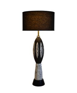 Mid Century Modern Black and White Ceramic Table Lamp, Large Scale, 1950's: Mid Century Modern black and white spotted ceramic table lamp, mat finish, 33 inches to top of socket, professionally rewired.Height: 33 in (83.82 cm)Diameter: 7 in (17.78 cm)SHADE NOT INCLUDED.