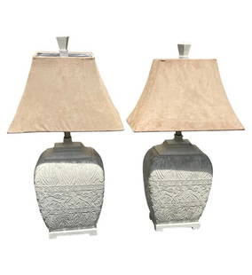 Pair of Hollywood Regency White Ceramic Table Lamps with Suede Shades: Pair of Hollywood Regency off white ceramic table lamps with suede shades. Height of the ceramic base is 16 inches.Height: 16 in (40.64 cm)Width: 12 in (30.48 cm)Depth: 8 in (20.32 cm)SHADES INCLUDED.