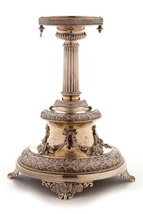 Silver table centrepiece: A Victorian silver table centrepiece, by Hukin and Heath, London 1877, with reeded design to the rim and column, wreath and swag design to base, raised on scroll and shell feet, 26cms high, 38oz gross